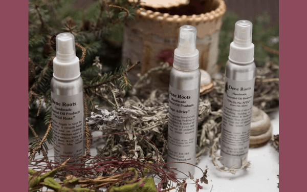 Three cans of Dene Roots smudge spray