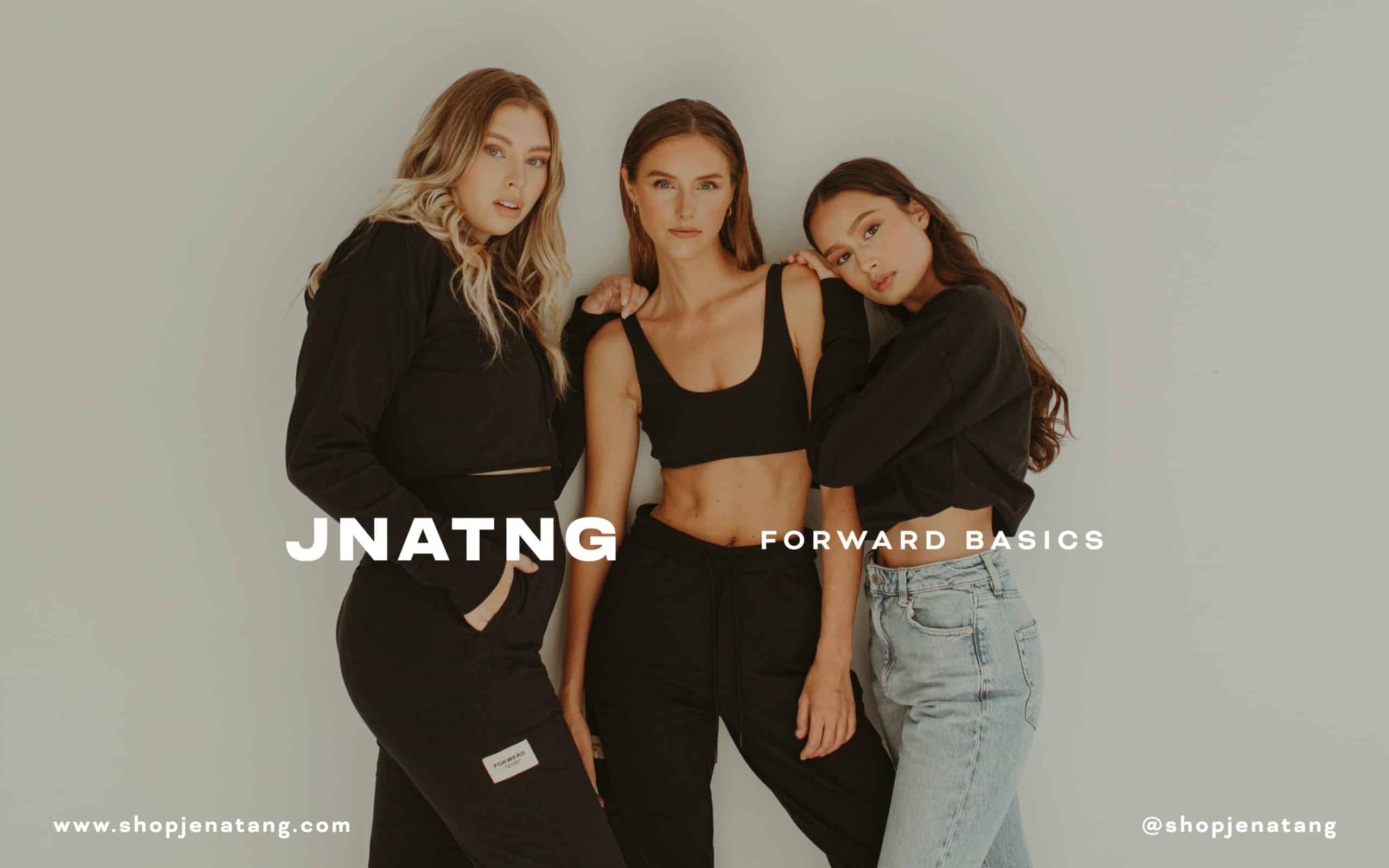 Three women wearing JNATNG clothing