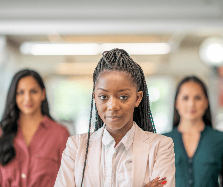 Diverse women in the workplace - three women standing side by side