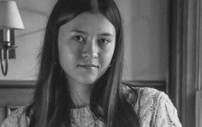 Black and white portrait of girl looking at camera