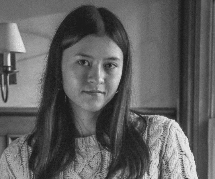 Black and white portrait of girl looking at camera